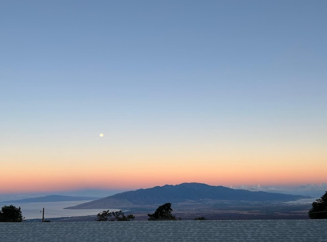 mountain view with a water view