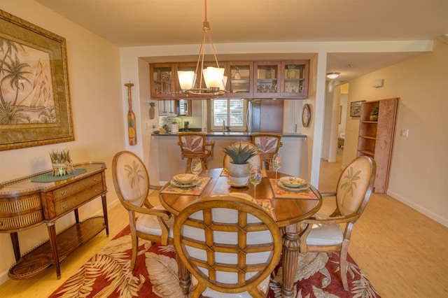 dining area with light wood-type flooring