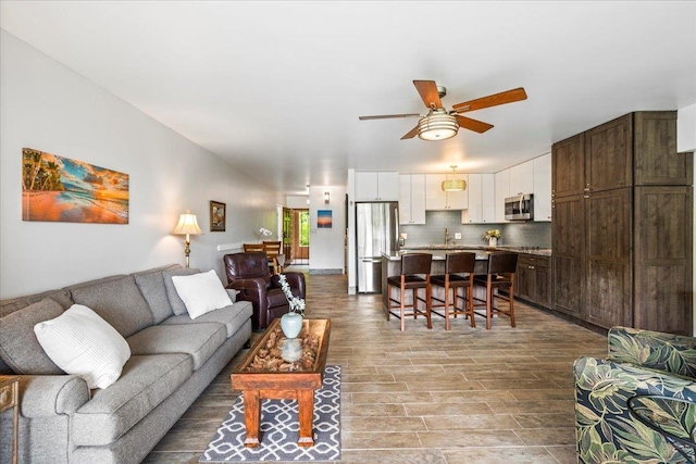 2387 S Kihei Rd Unit C108, Kihei, HI 96753 - living room with a ceiling fan and wood finished floors