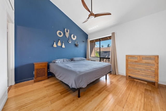 15 Kulanihakoi St Unit 3E, Kihei, HI 96753 - bedroom featuring lofted ceiling, light wood-type flooring, a ceiling fan, and access to exterior