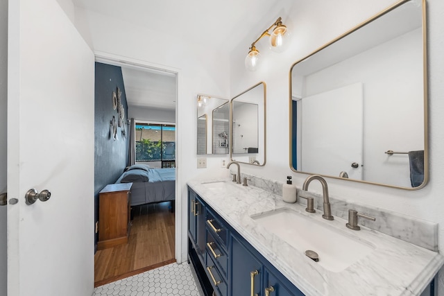 15 Kulanihakoi St Unit 3E, Kihei, HI 96753 - ensuite bathroom with a sink, double vanity, ensuite bathroom, and tile patterned floors