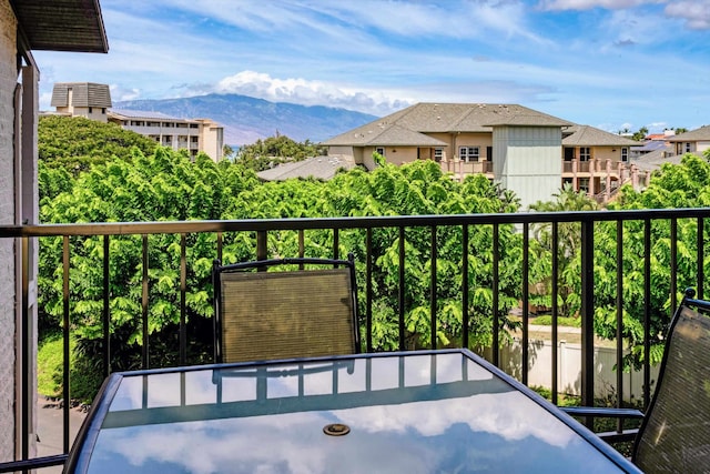 balcony featuring a mountain view