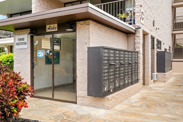 view of home's community with mail boxes