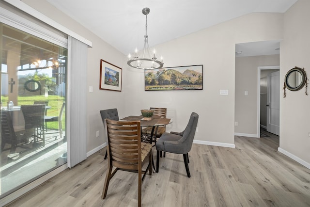 155 Aliilani Pl, Kihei, HI 96753 - dining space featuring wood finished floors, vaulted ceiling, plenty of natural light, a chandelier, and baseboards