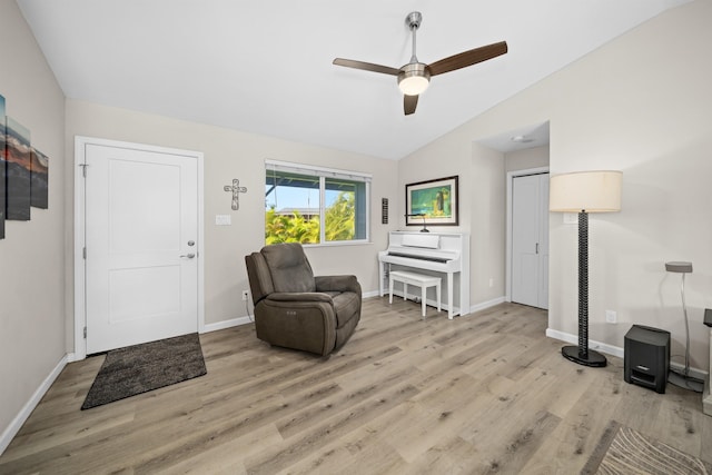 155 Aliilani Pl, Kihei, HI 96753 - sitting room with lofted ceiling, light wood finished floors, a ceiling fan, and baseboards