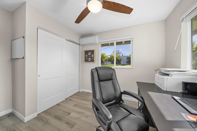 155 Aliilani Pl, Kihei, HI 96753 - office space with an AC wall unit, a ceiling fan, light wood-style floors, and baseboards