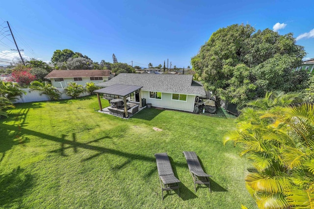 155 Aliilani Pl, Kihei, HI 96753 - rear view of house featuring a lawn and roof with shingles