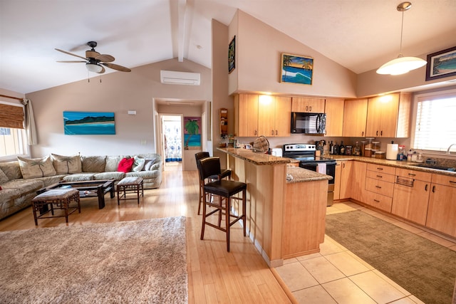 kitchen featuring pendant lighting, electric range, a kitchen breakfast bar, light brown cabinetry, and kitchen peninsula