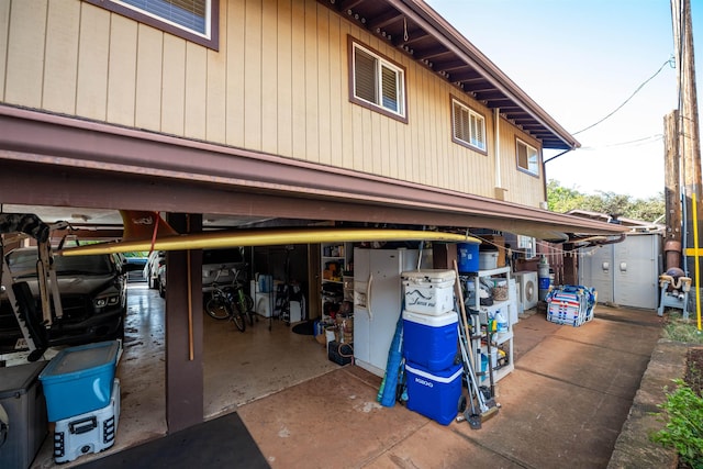 view of home's exterior with washer / dryer