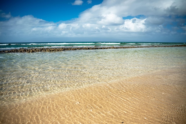 view of water feature featuring a beach view