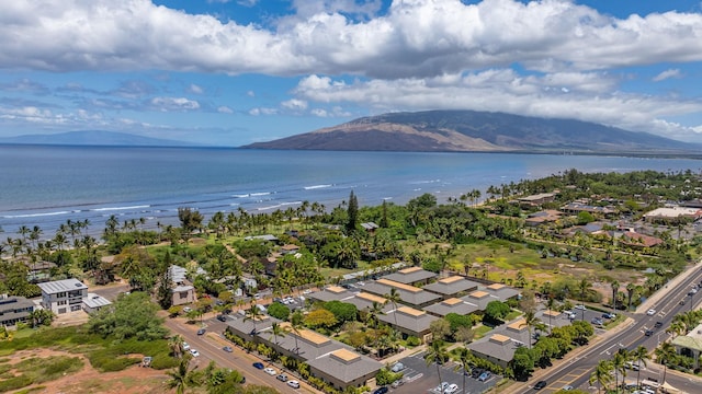 aerial view with a water and mountain view and a residential view