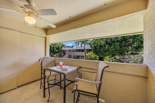 balcony featuring a ceiling fan