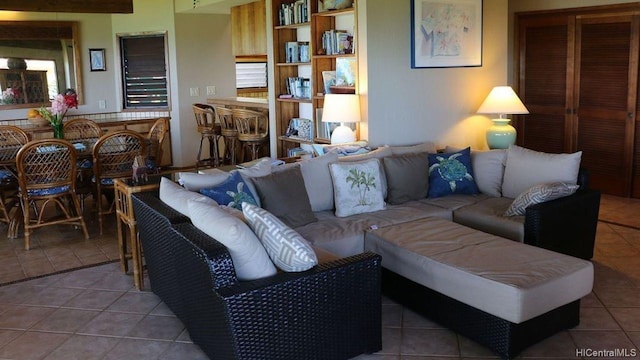 living room with light tile patterned floors