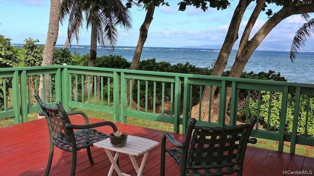 deck featuring a water view