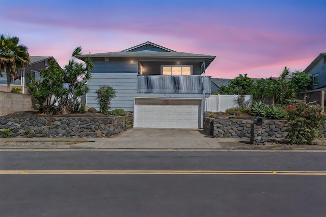 885 Haunani Pl, Wailuku, HI 96793 - view of front of home featuring an attached garage, driveway, and fence