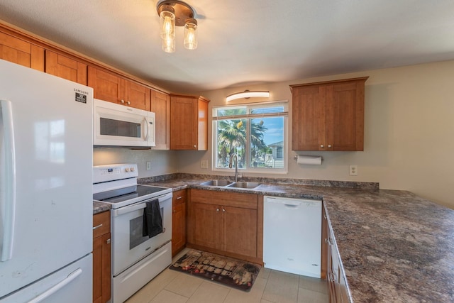 885 Haunani Pl, Wailuku, HI 96793 - kitchen featuring white appliances, brown cabinets, a sink, and light tile patterned floors