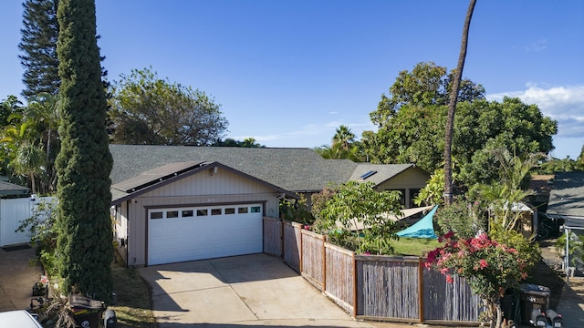 view of front of home with a garage