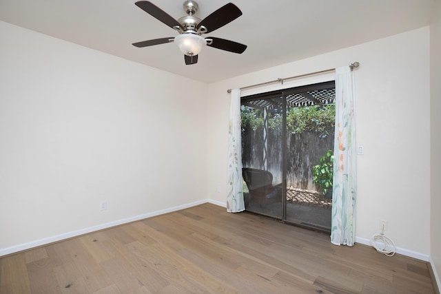 empty room with light hardwood / wood-style floors and ceiling fan