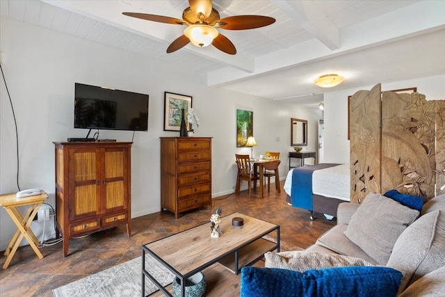 tiled living room with beam ceiling and ceiling fan