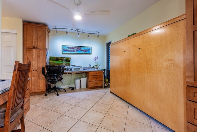 office area featuring light tile patterned floors, a ceiling fan, and track lighting