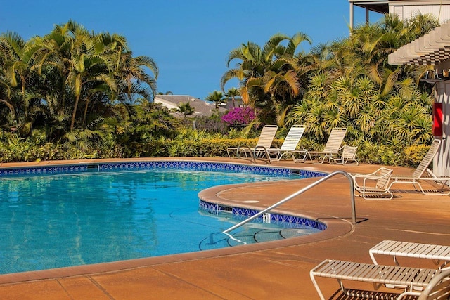 pool with a patio