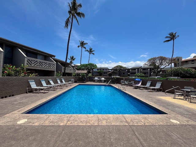 pool featuring a patio area