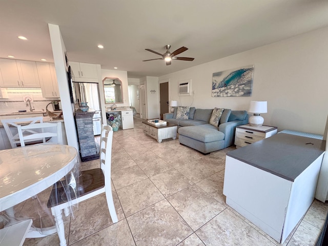 living room featuring recessed lighting, ceiling fan, and light tile patterned floors
