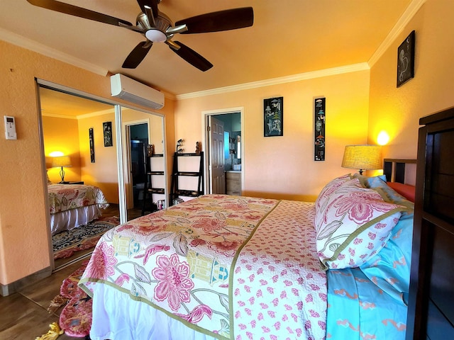 bedroom featuring a wall mounted air conditioner, ensuite bath, ornamental molding, and a closet