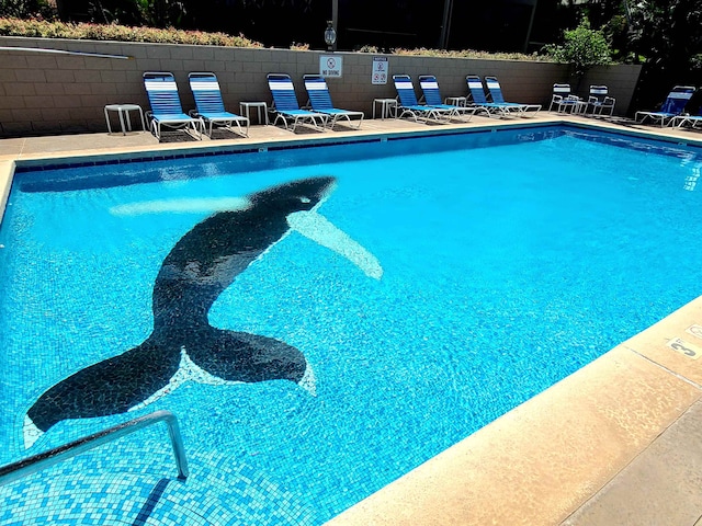 view of pool with a patio area