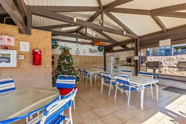 view of patio / terrace featuring a gazebo, ceiling fan, and an outdoor kitchen