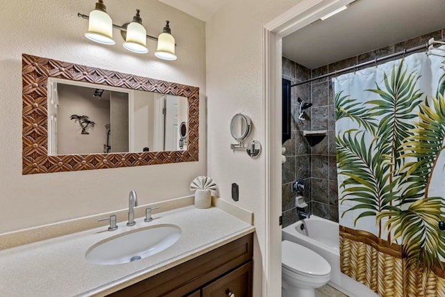 full bathroom featuring shower / bath combination with curtain, vanity, and toilet