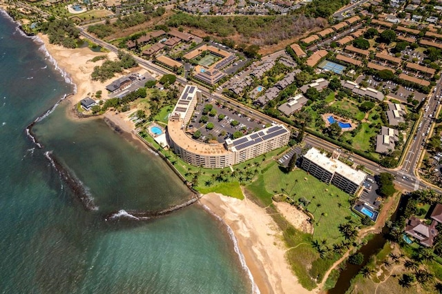 bird's eye view featuring a water view and a view of the beach