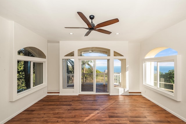 interior space featuring dark hardwood / wood-style floors and ceiling fan