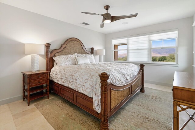 2335 Hihimanu St Unit 117, Kihei, HI 96753 - bedroom featuring baseboards and a ceiling fan