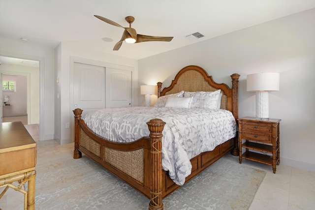 2335 Hihimanu St Unit 117, Kihei, HI 96753 - bedroom with a closet, ceiling fan, and light tile patterned floors
