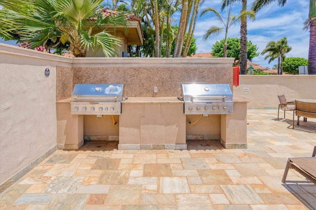 2335 Hihimanu St Unit 117, Kihei, HI 96753 - view of patio / terrace featuring exterior kitchen