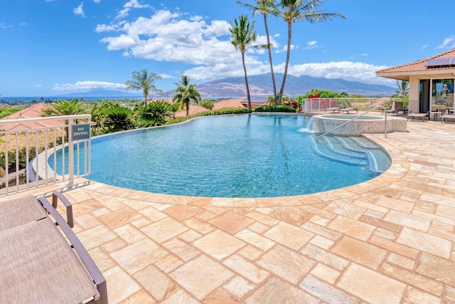 2335 Hihimanu St Unit 117, Kihei, HI 96753 - view of swimming pool with a patio area, a mountain view, and a pool with connected hot tub