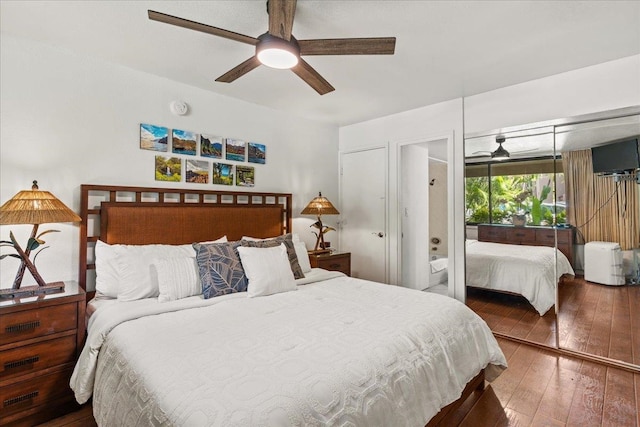 bedroom featuring ceiling fan and dark wood-type flooring