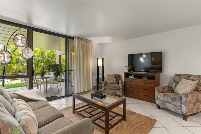 living room with expansive windows and light tile floors