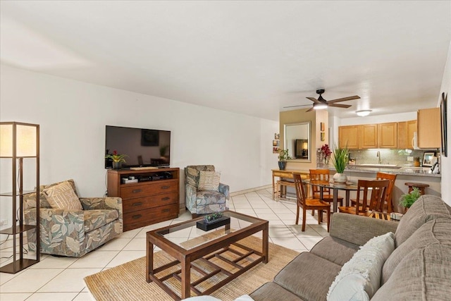 tiled living room featuring ceiling fan