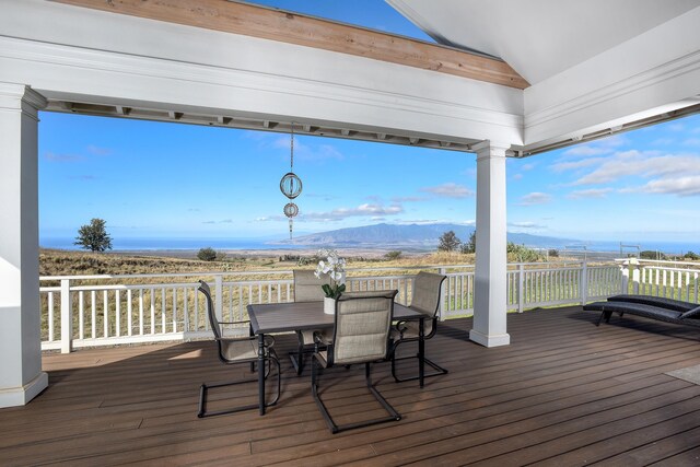 wooden deck featuring a mountain view