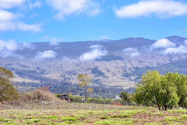 view of mountain feature with a rural view