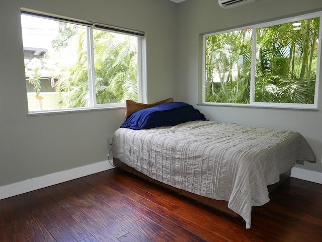 bedroom featuring wood-type flooring