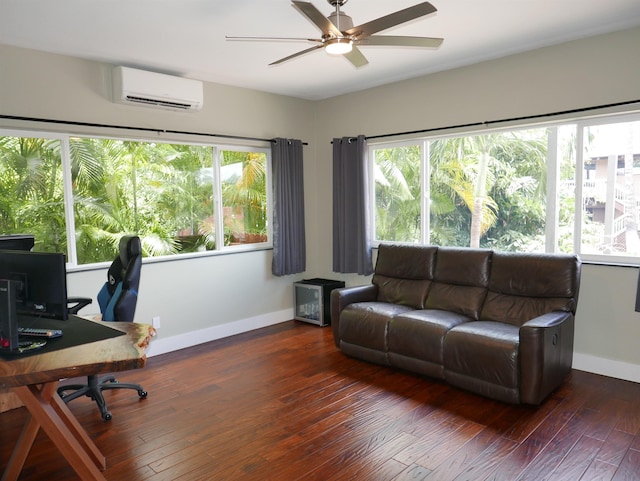 office space with dark hardwood / wood-style floors, a wall unit AC, and a wealth of natural light