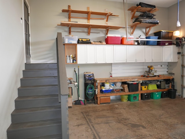 garage with a workshop area