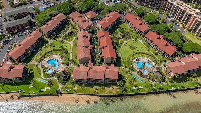 drone / aerial view with a water view