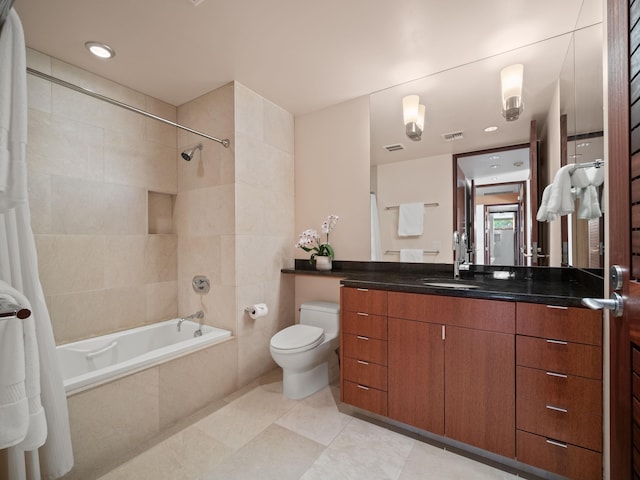 3100 Wailea Alanui Dr Unit 12, Kihei, HI 96753 - bathroom with tiled shower / bath, toilet, vanity, tile patterned flooring, and recessed lighting