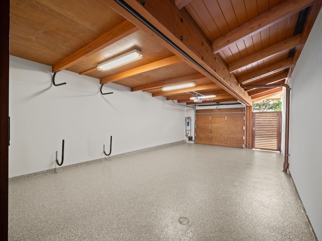 3100 Wailea Alanui Dr Unit 12, Kihei, HI 96753 - garage featuring wood ceiling and a garage door opener