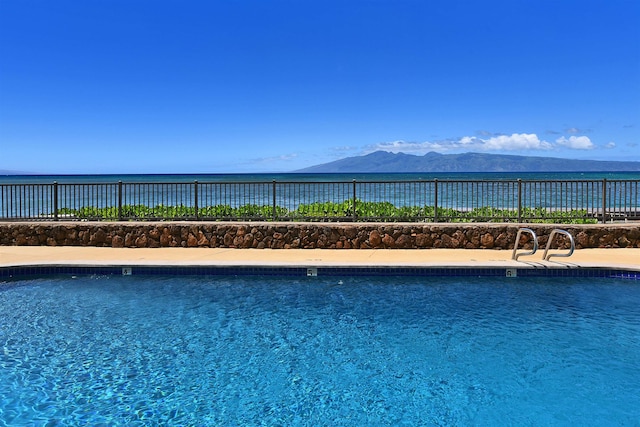 view of pool with a mountain view