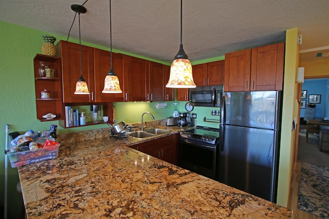 kitchen with kitchen peninsula, stainless steel fridge, electric range oven, pendant lighting, and sink